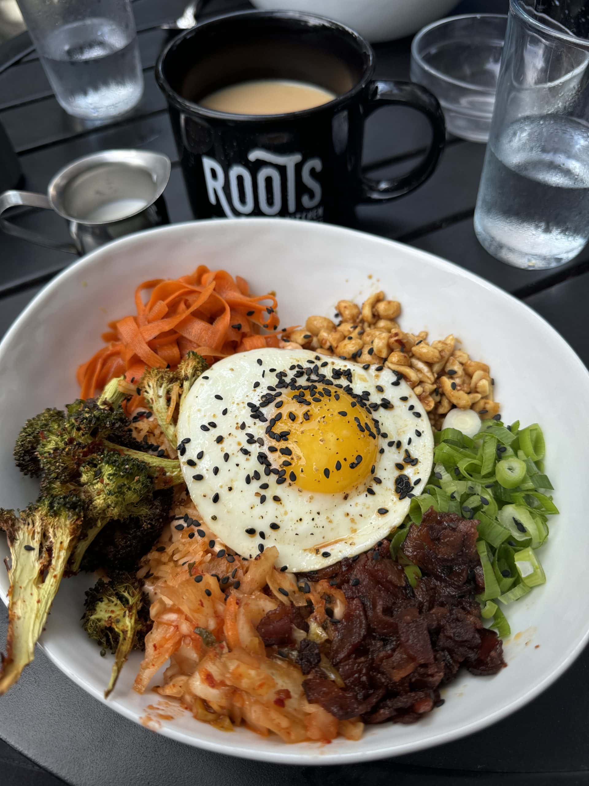 best breakfast in door county is at roots inn and kitchen, this is a spin on a kimchi bowl with egg and veggies