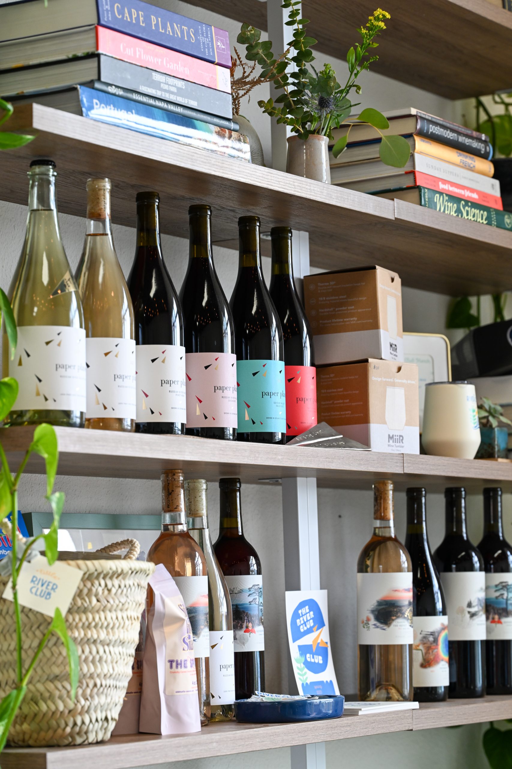 shelves of wine and merchandise at the river club in napa valley