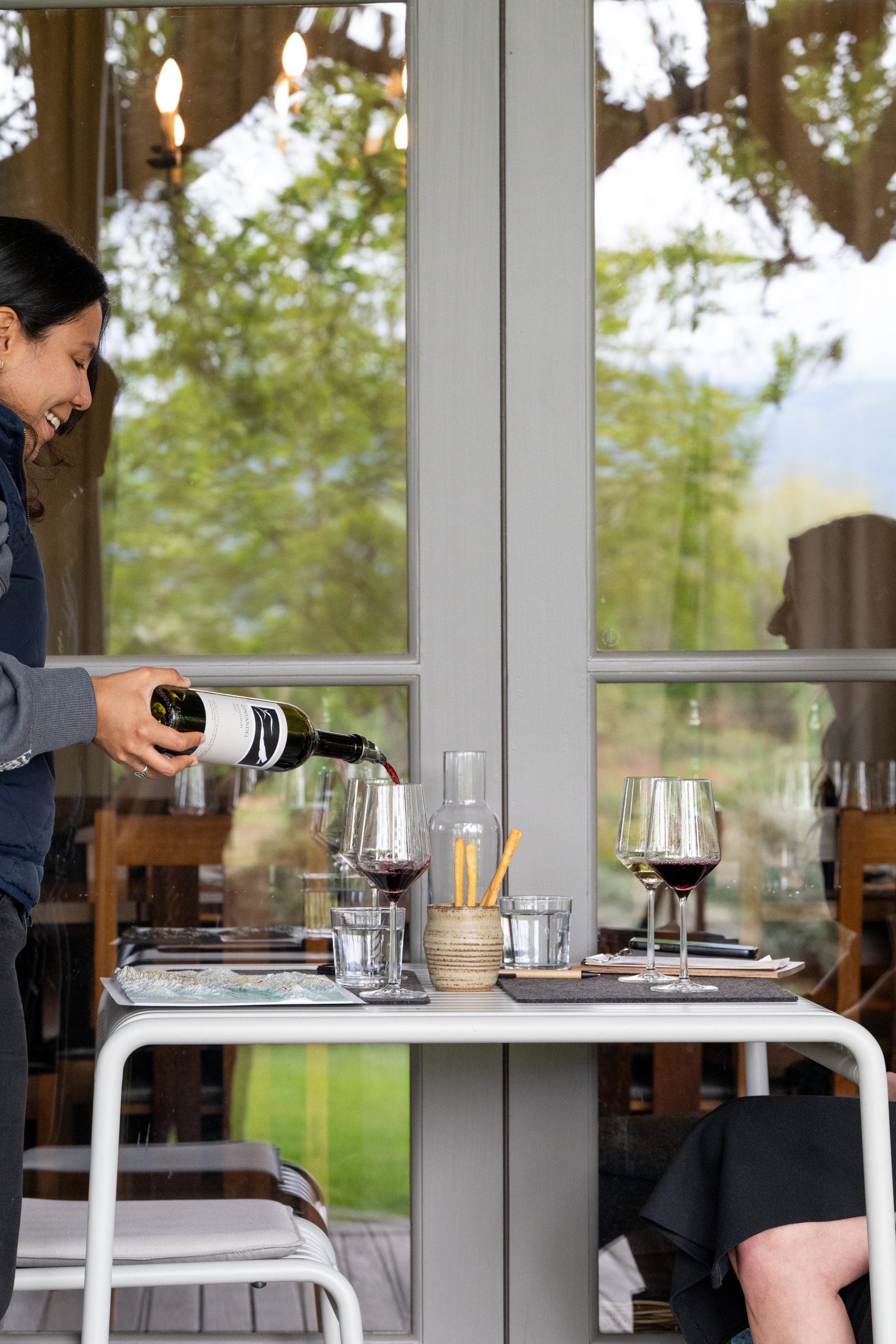 pour wine at frog's leap in napa valley