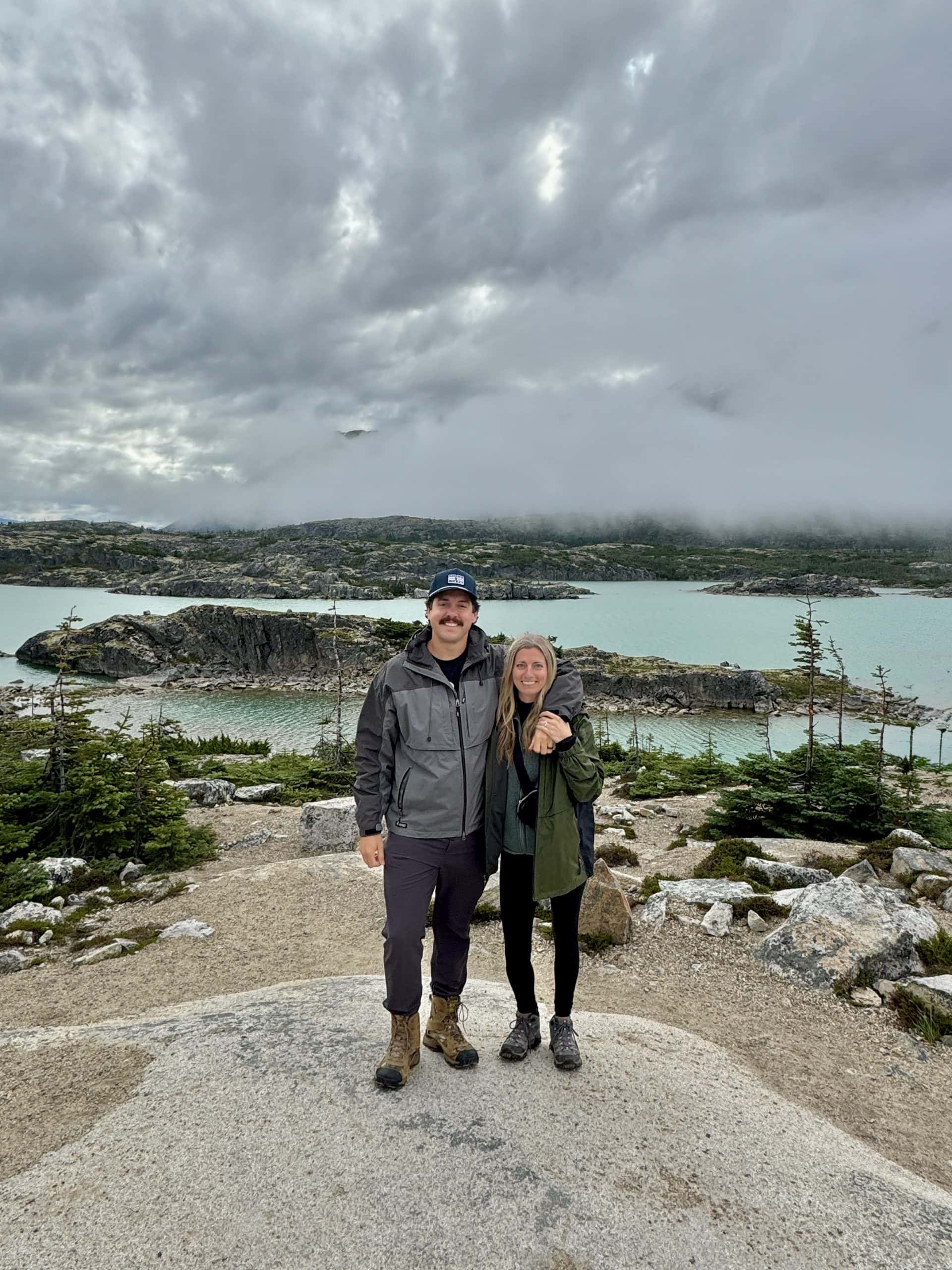 White Pass Rail Way and Yukon Route in Skagway Alaska. James and I posing on the mountains image on my Alaska Cruise Packing List post.
